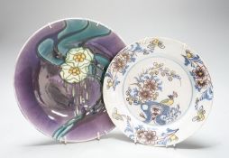 An 18th century delftware polychrome plate and a Mintons secessionist dish (2) 26cm