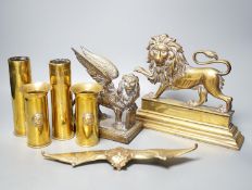 A brass ‘bat’ pin tray, two lion figures and sundry metalware, lion door stop 20 cms height x 25 cms