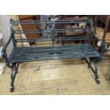 A Victorian style Coalbrookdale design green painted cast iron garden bench, length 123cm, depth