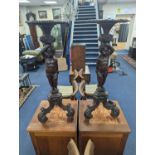 A pair of 18th century style Italian carved walnut figural torcheres with cherub stems, height 96cm