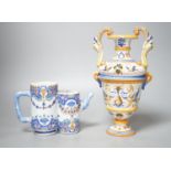 A Ginori maiolica two handled vase and Delft polychrome double cylinder teapot 27cm