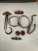 A small group of mixed Victorian gilt white metal and garnet set jewellery, including bangles,