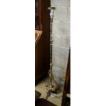 An Edwardian brass telescopic lamp standard, with Benson style foliate base, height 140cm