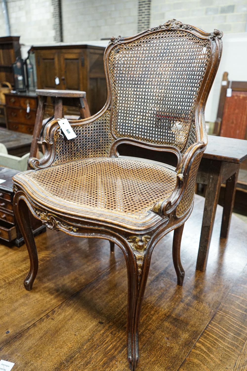 A 19th century French carved and caned walnut salon chair, width 52cm, depth 46cm, height 87cm - Image 2 of 3