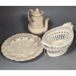 An English 18th century creamware chestnut dish and stand and a serpentine dish, A gilt decorated