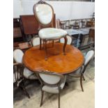 A set of six Victorian mahogany upholstered balloon back dining chairs together with a Victorian