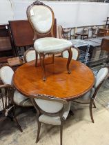 A set of six Victorian mahogany upholstered balloon back dining chairs together with a Victorian