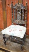 A Carolean style carved oak child's chair, height 70cm
