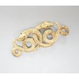 A yellow metal and enamel set twin serpent brooch, (a.f.), 58mm, gross weight 9 grams.