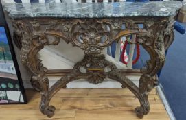 An 18th century style carved giltwood serpentine console table with serpentine marble top, width