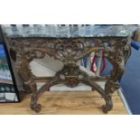 An 18th century style carved giltwood serpentine console table with serpentine marble top, width