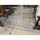 A contemporary perspex and glass square two tier coffee table, width 120cm, height 40cm