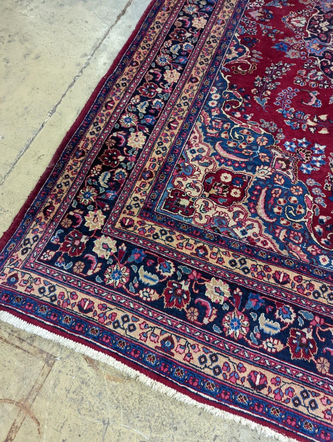 A Tabriz burgundy ground carpet, 350 x 250cm - Image 2 of 4