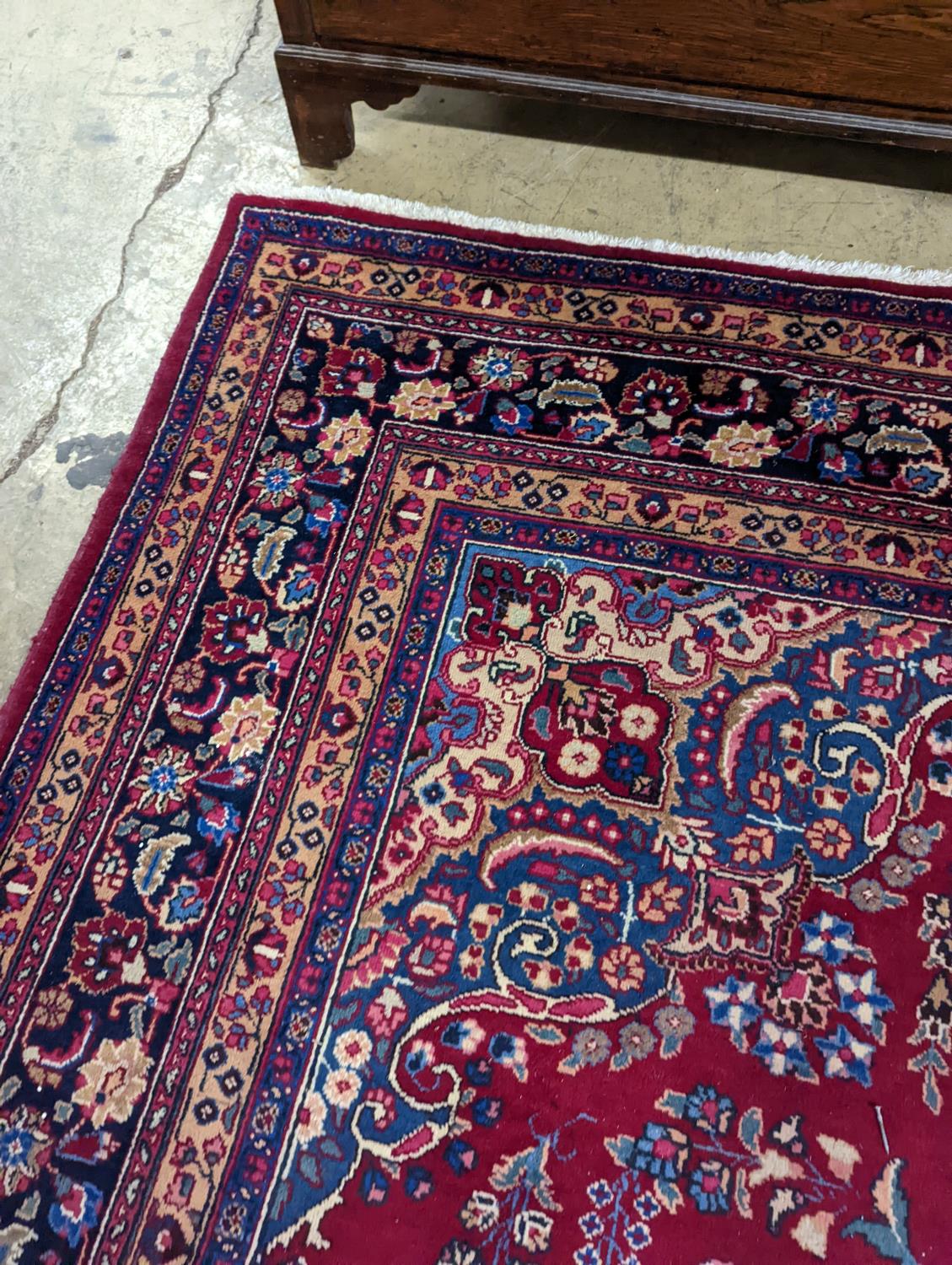 A Tabriz burgundy ground carpet, 350 x 250cm - Image 4 of 4