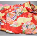 A multi-coloured silk kimono, a floral kimono and a child's silk kimono