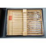 A cased modern silver forty four piece canteen of King's pattern cutlery by Mappin & Webb,