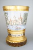 A 19th century Bohemian enamelled and gilded glass beaker 11cm, with titled scene Layenburg bei