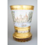 A 19th century Bohemian enamelled and gilded glass beaker 11cm, with titled scene Layenburg bei