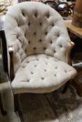 A George III Hepplewhite style mahogany tub chair, with later buttoned upholstery, acanthus carved
