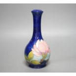 A Moorcroft magnolia pattern bottle vase 22.5cm