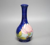 A Moorcroft magnolia pattern bottle vase 22.5cm