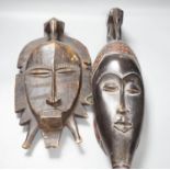 Two African carved wood masks; Senufo and Baule 65cm