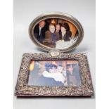 An Edwardian repousse silver mounted photograph frame, Deakin & Francis, Birmingham, 1901, width