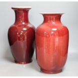 Two large Chinese sang de boeuf glazed vases tallest 36cm