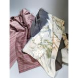 A reversible crepe de chine kimono, a cream printed kimono, a black kimono and a maroon stripe