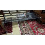 A contemporary rectangular glass coffee table, length 114cm, depth 60cm, height 43cm