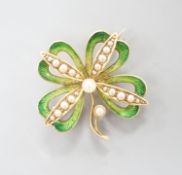 An Edwardian 15ct, seed pearl and green enamel set clover brooch, with later bale attachment,