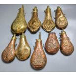 Eight assorted 19th century copper shot flasks