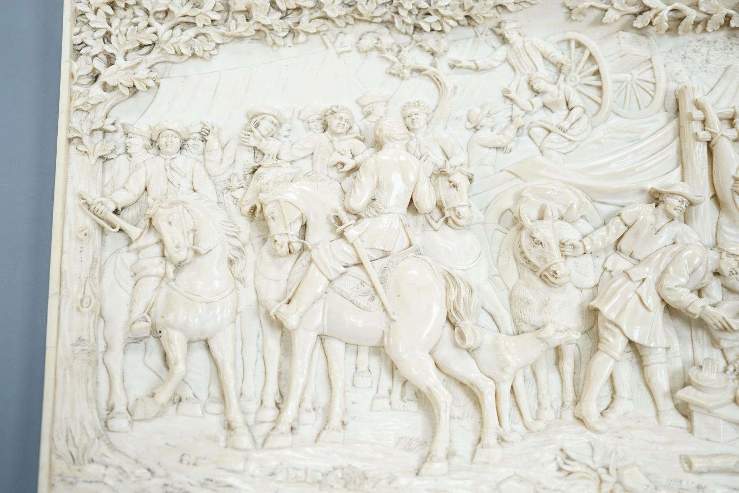 An 18th century Flemish carved ivory plaque (initials OF?) with scenes of hunters and village - Image 2 of 4