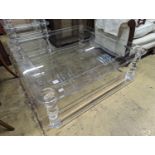 A contemporary square perspex and glass two tier coffee table, length 120cm, depth 40cm