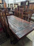 A South African distressed hardwood rectangular refectory dining table, length 200cm, depth 100cm,