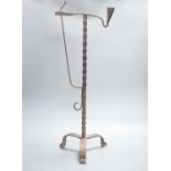 A 17th / 18th century wrought iron candle rushlight holder 68cm