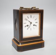 A 19th century French mahogany cased mantel clock, key and pendulum