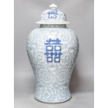 A large 19th century Chinese blue and white ‘Shou’ baluster vase and cover 60cm