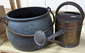 A large copper cauldron, 54cm wide and watering can
