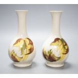 A pair of Moorcroft ‘leaves in the wind’ vases 15.5cm