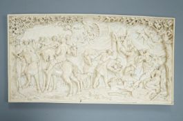 An 18th century Flemish carved ivory plaque (initials OF?) with scenes of hunters and village