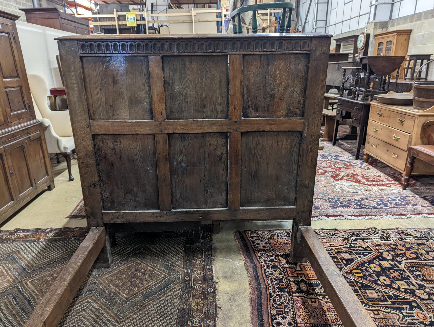 A 17th century style panelled oak bedstead, width 143cm, length 204cm, height 140cm - Image 3 of 3