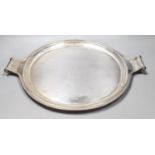 A George V silver circular two handled tray, with engraved border, John Round & Son Ltd,