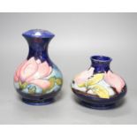 Two Moorcroft magnolia pattern vases 17cm