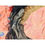 A 19th century silk woven shawl, a 1930's cut velvet shawl, a printed crepe de chine shawl, a