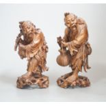 Two Chinese hardwood figures of a fisherman and a old man holding peaches 16cm