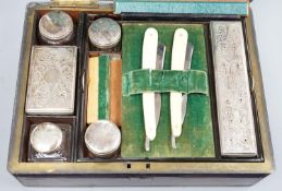 A Victorian brass mounted burr walnut toilet box, fitted with glass jars with electroplated tops,