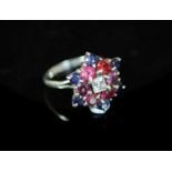 A mid 20th century platinum, ruby, sapphire diamond and amethyst cluster dress ring,set with
