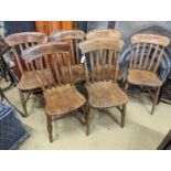 A harlequin set of six Victorian elm and beech Windsor lathe back kitchen chairs