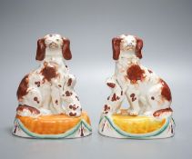 A pair of Staffordshire spaniel and puppy groups, 15cm high